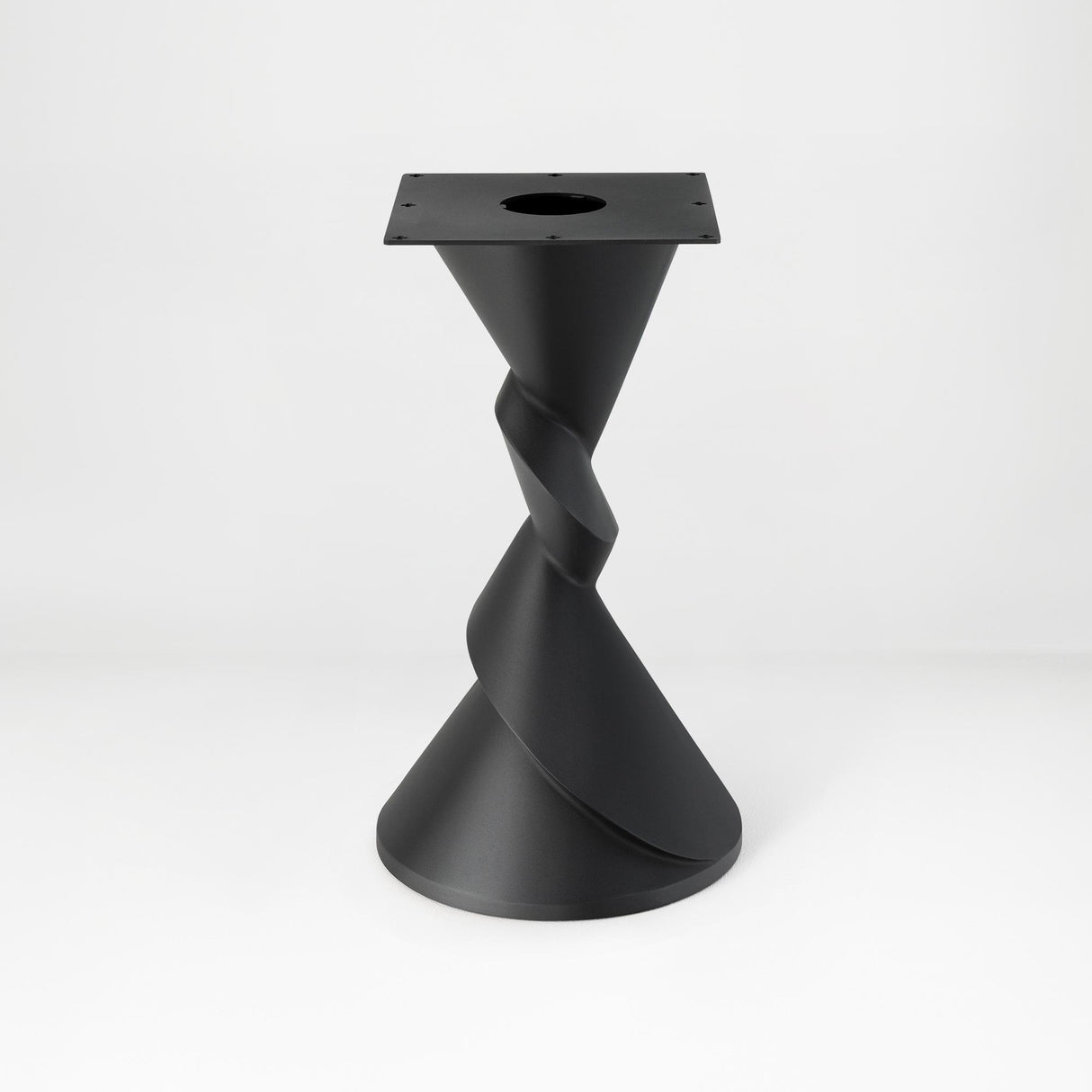 Metal Table Base 340 | 340S Horix 28.5" H – dynamic forward-leaning pedestal base in matte black powder-coated steel. This heavy-duty sculptural metal base provides an oval sturdy foundation (1,000 lbs capacity) in two sizes: Model 340 (16"x16") and Model 340S (34"x18"). A premium DIY steel table base engineered for a heavy live-edge tabletop, marble slab, or wood top.