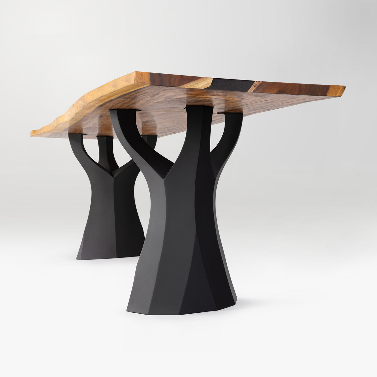 modern dining table with wooden top and black curved legs
