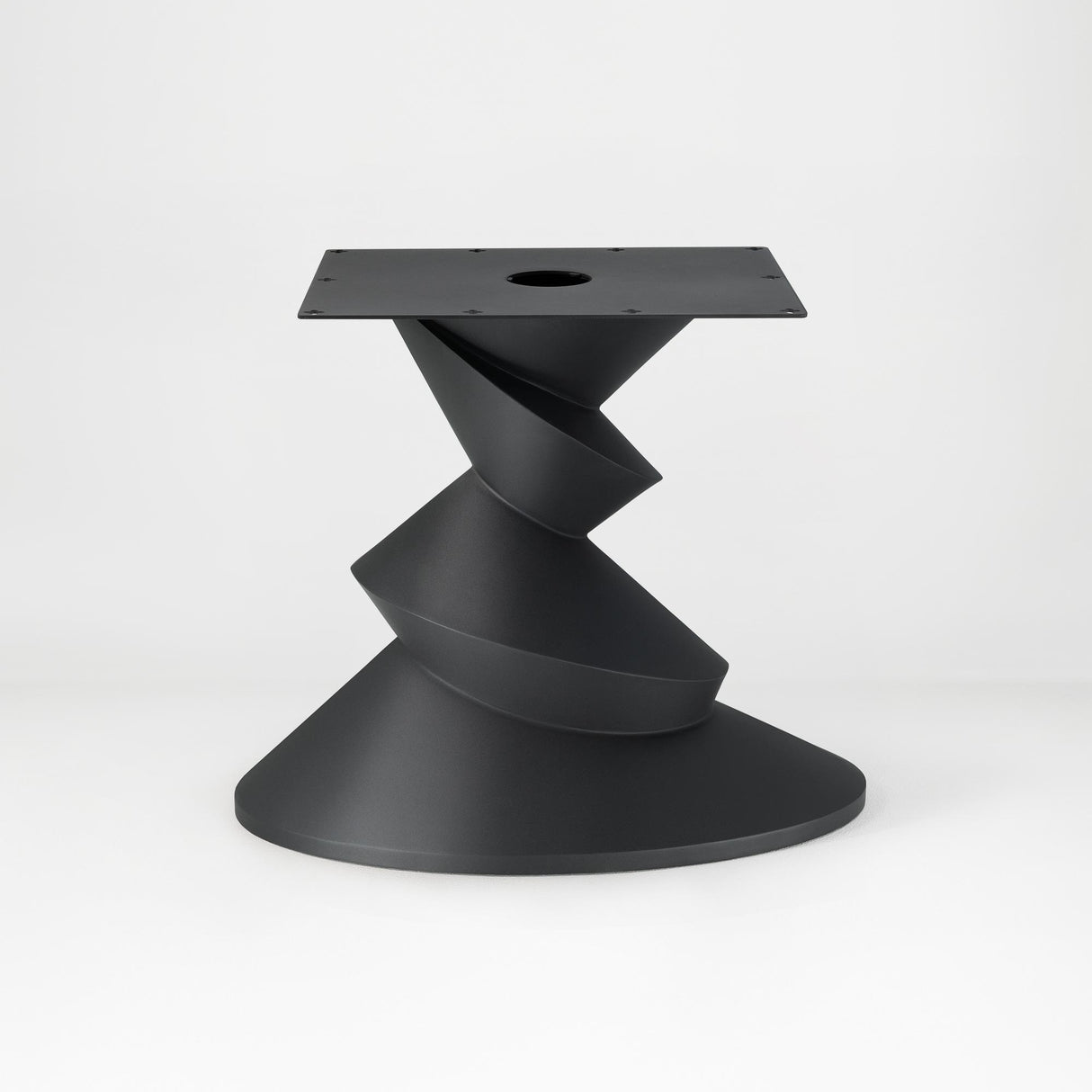 Metal Table Base 340 | 340S Horix 28.5" H – dynamic forward-leaning pedestal base in matte black powder-coated steel. This heavy-duty sculptural metal base provides an oval sturdy foundation (1,000 lbs capacity) in two sizes: Model 340 (16"x16") and Model 340S (34"x18"). A premium DIY steel table base engineered for a heavy live-edge tabletop, marble slab, or wood top.