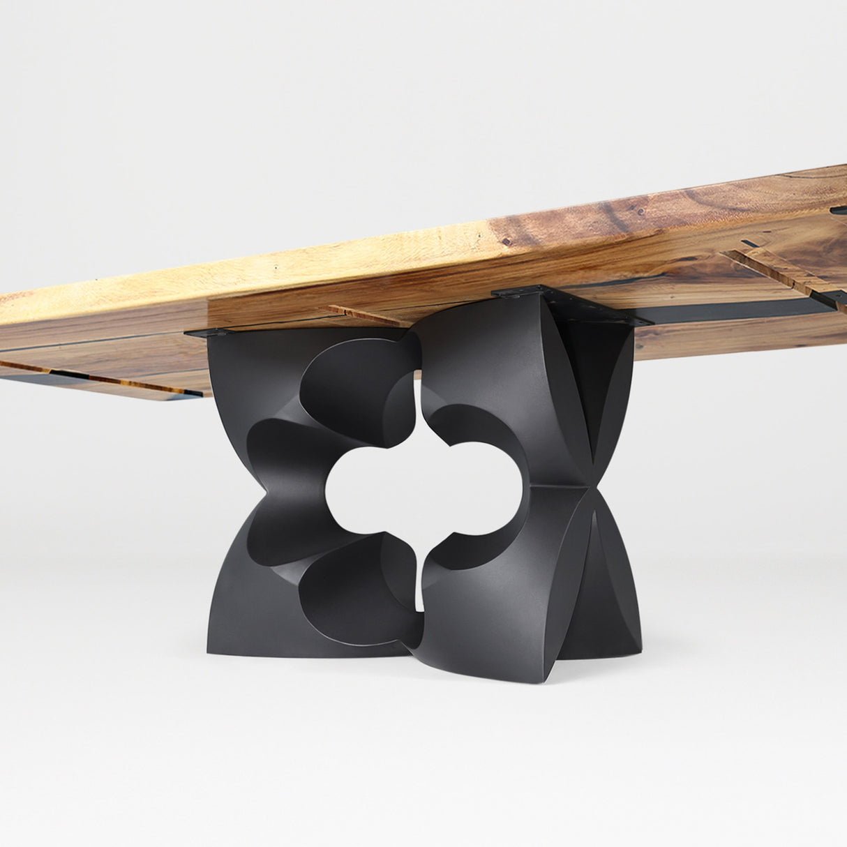 Metal Table Base 344 Chloris Petal 28.5" H – flower-inspired pedestal base handcrafted from heavy-duty powder-coated steel in matte black. This heavy-duty sculptural metal base features an elongated botanical petal silhouette and a sturdy foundation (1,000 lbs capacity; 34"L x 18"W). A premium DIY steel table base and modern furniture foundation specifically engineered to support a heavy live-edge tabletop, rectangular wood top, or marble slab in dining rooms.