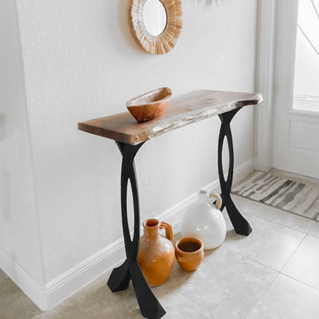Live-edge counter table supported by 602 Curva 36.3" H cruved design counter metal table legs in a bright entryway setting.