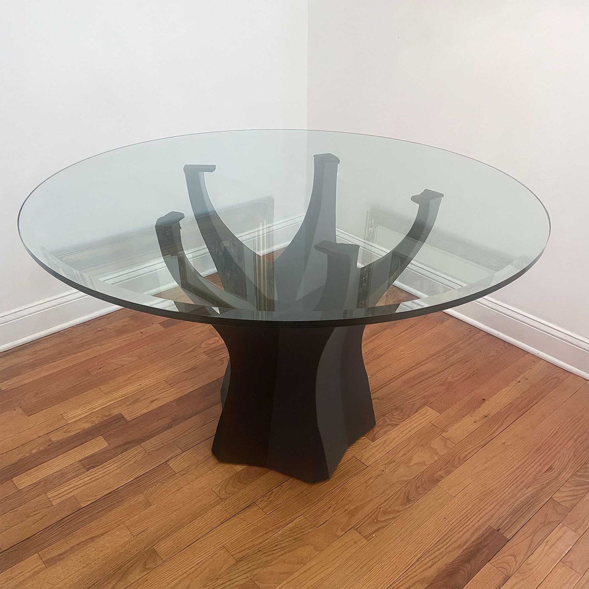 glass dining table with black table base