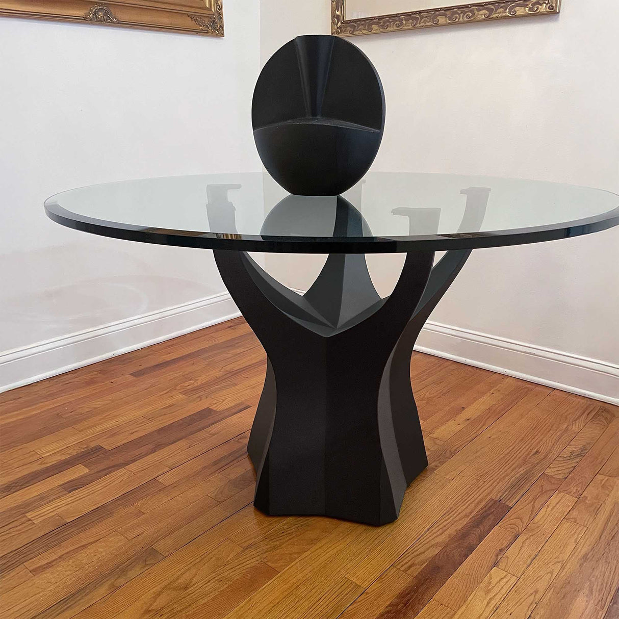 black metal table base with curved steel legs
