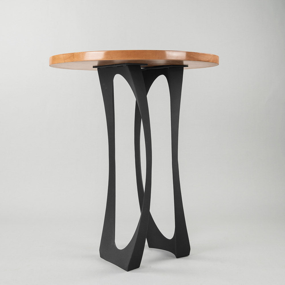 Side view of 603 Cleo 34.3" H metal leg for counter table with artistic oval-shaped structure.