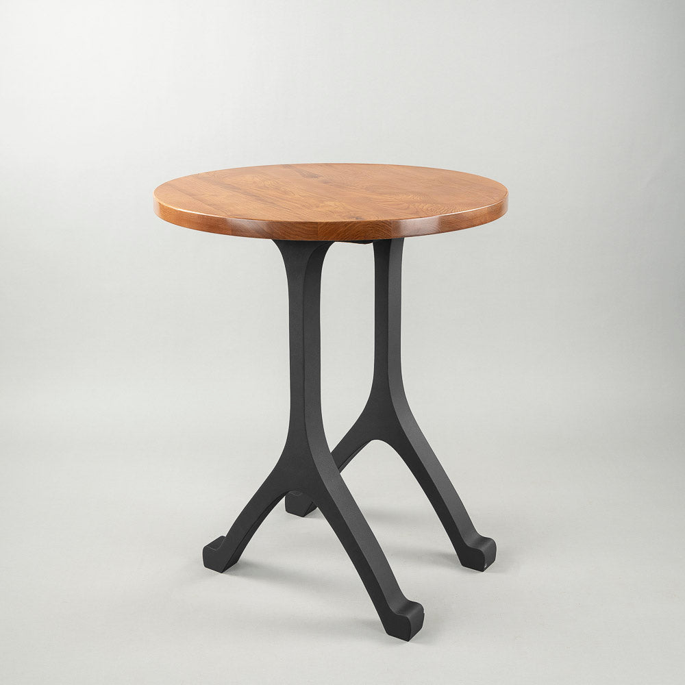 Compact counter table with 612 Wishbone 34" H black metal legs for counter table, emphasizing clean and stable design.