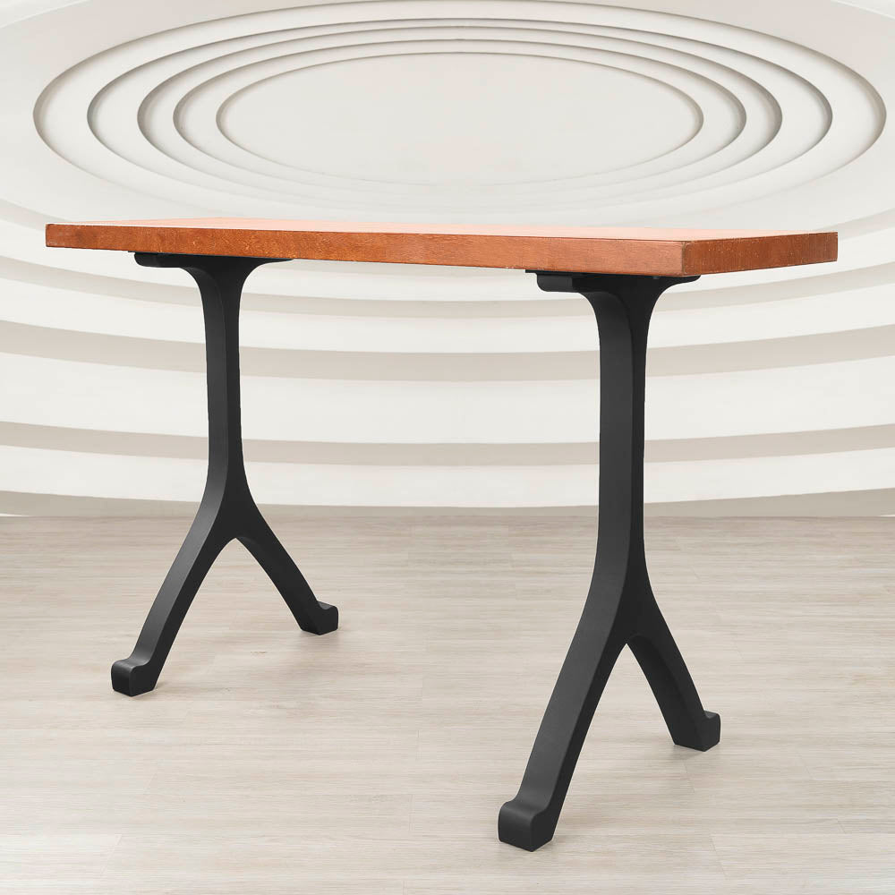 Front view of wooden counter table supported by durable 612 Wishbone 34" H metal counter table legs in a modern Y-shaped form.