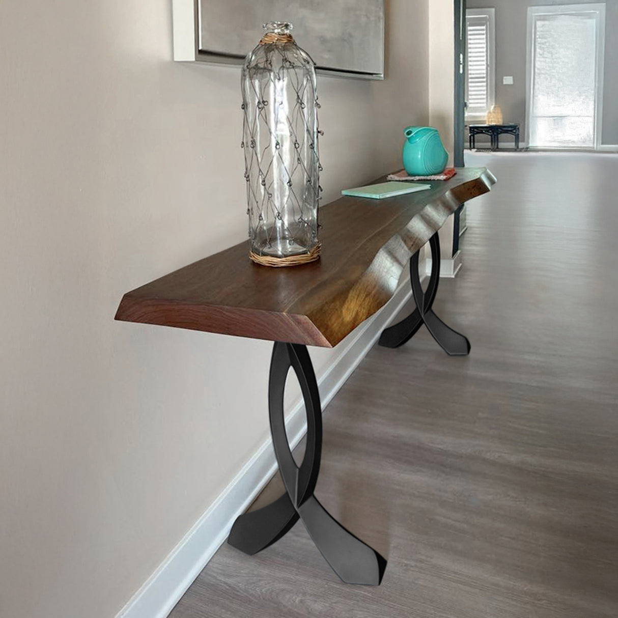 Wall-mounted counter table using 607 Curva 40.3" H metal leg for counter table in small entryway.