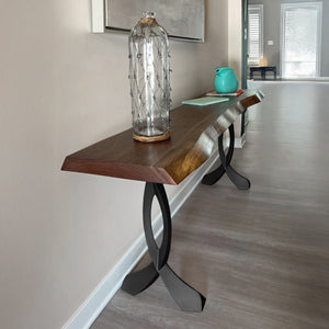 Wall-mounted counter table using 607 Curva 40.3" H metal leg for counter table in small entryway.