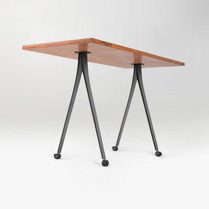 wooden table with black metal legs 
