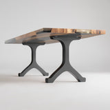 wishbone bench legs supporting a live edge wooden table