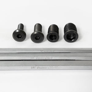 four black screws with a metal hex key below