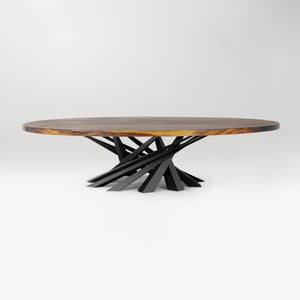 round wooden table with a metal base on a white background