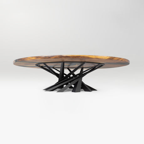 round wooden table with a black metal base on a white background