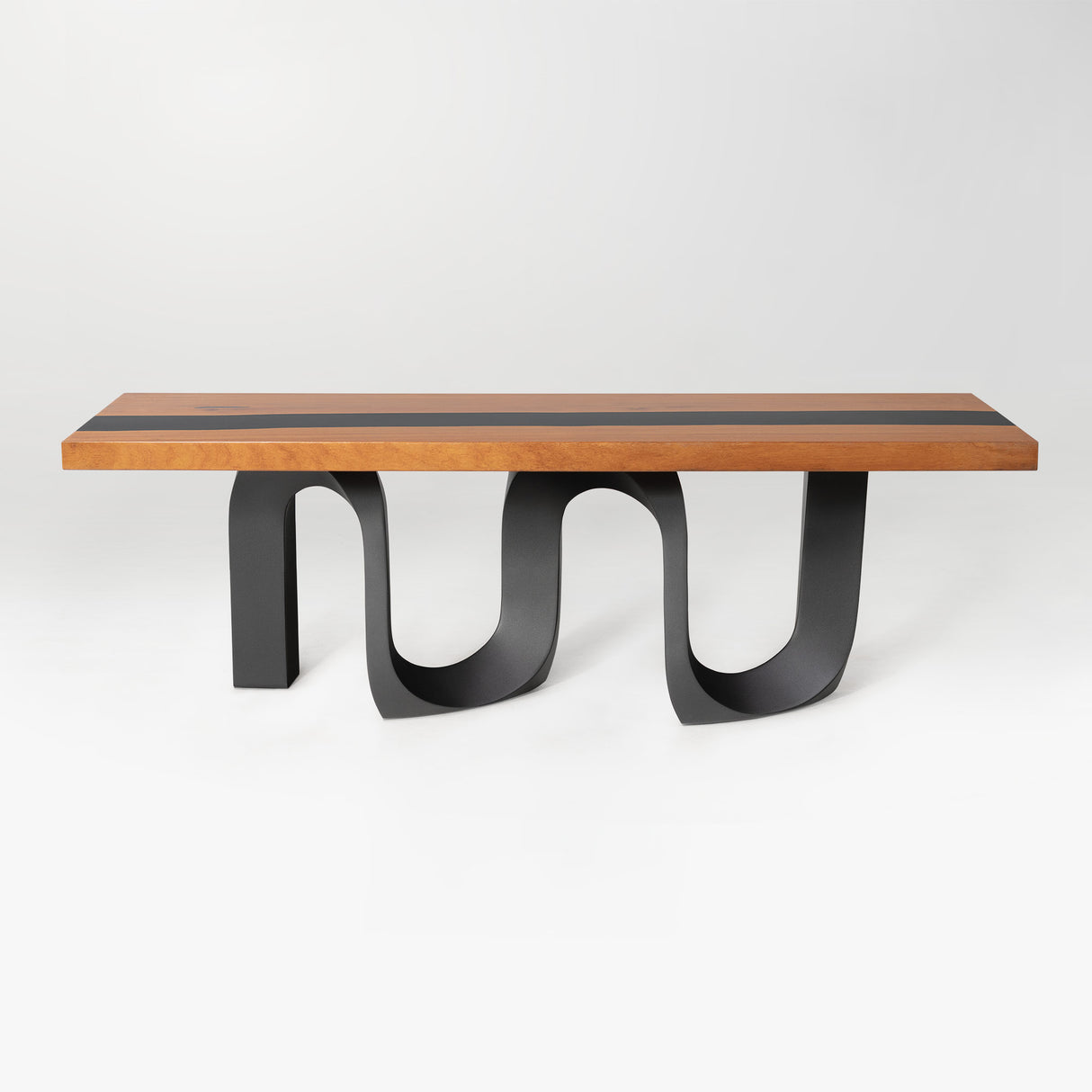 Wooden table with black U-shaped metal legs shown from the front view