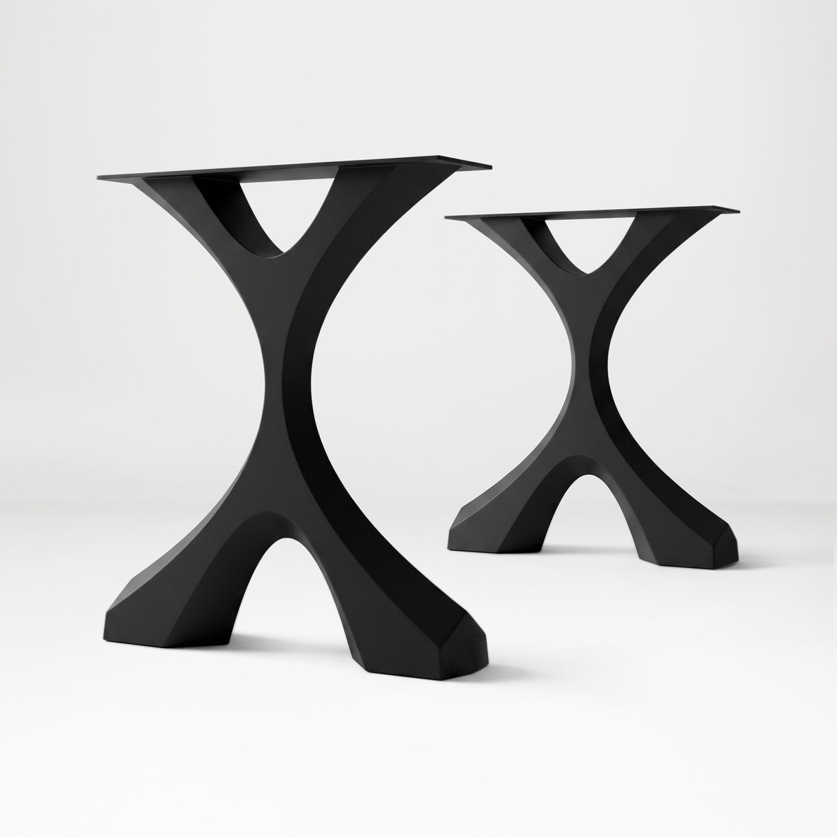 Metal Coffee Table Base 120 Xavier 16.1" H – Scandinavian modern table base set (2 pieces) handcrafted from heavy-duty powder-coated steel in matte black. This sleek metal coffee table base features a bold angled silhouette and a sturdy foundation (500 lbs capacity; 14.4"L). A premium DIY steel table base engineered with wide pre-drilled mounting plates to support a heavy live-edge tabletop, wood top, or custom coffee table.