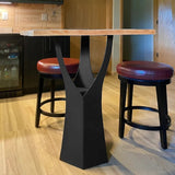 Rustic 36" H counter table base metal creating cozy dining space with wooden chairs