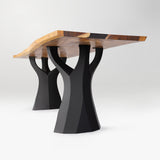 modern dining table with wooden top and black curved legs