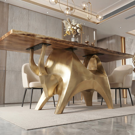 Gold Table Base 803 Bullos 28.5" H – luxury bull-inspired pedestal base handcrafted from stainless steel with a brushed gold finish. This sculptural metal base features powerful muscular curves and a wide sturdy foundation (1,000 lbs capacity), ideal for large custom dining tables or executive boardrooms. A premium DIY furniture base and heavy-duty steel table base designed for marble, glass, or wood tops in high-end modern interiors.