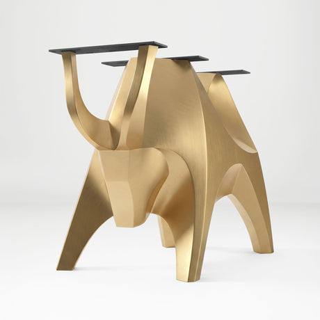 Gold Table Base 803 Bullos 28.5" H – luxury bull-inspired pedestal base handcrafted from stainless steel with a brushed gold finish. This sculptural metal base features powerful muscular curves and a wide sturdy foundation (1,000 lbs capacity), ideal for large custom dining tables or executive boardrooms. A premium DIY furniture base and heavy-duty steel table base designed for marble, glass, or wood tops in high-end modern interiors.