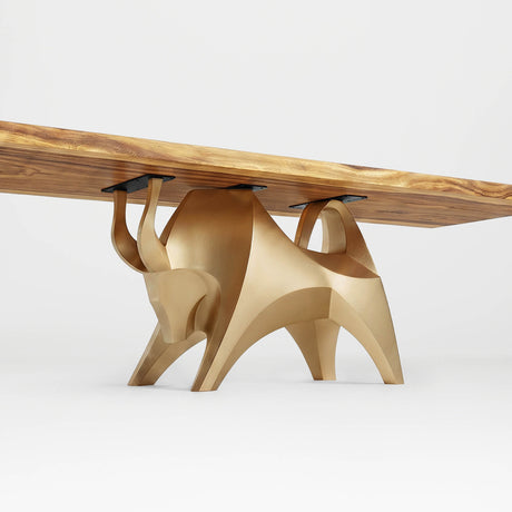 Gold Table Base 803 Bullos 28.5" H – luxury bull-inspired pedestal base handcrafted from stainless steel with a brushed gold finish. This sculptural metal base features powerful muscular curves and a wide sturdy foundation (1,000 lbs capacity), ideal for large custom dining tables or executive boardrooms. A premium DIY furniture base and heavy-duty steel table base designed for marble, glass, or wood tops in high-end modern interiors.