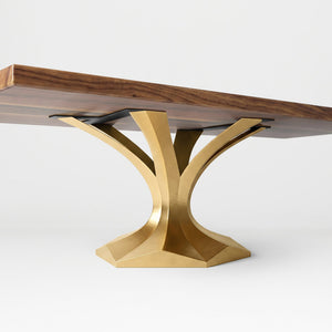 Gold Table Base 304 Dentro 28.5" H – luxury pedestal base handcrafted from stainless steel with a premium brushed gold finish. This heavy-duty metal base features sleek Mid-Century Modern lines and a sturdy foundation (1,000 lbs capacity), specifically engineered to support a heavy live-edge tabletop, thick marble slab, or glass top. A sophisticated DIY steel table base and modern furniture foundation that ensures steady support for upscale dining rooms and executive office desks.