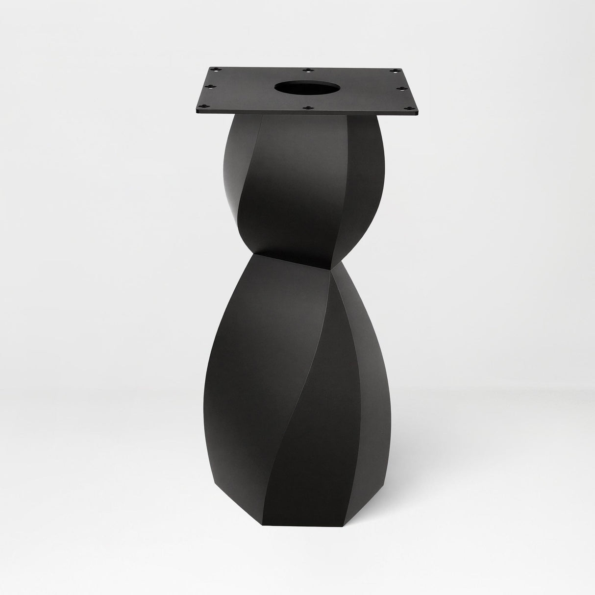 Metal Table Base 338 Eve 28.5" H – graceful and soft pedestal base handcrafted from heavy-duty powder-coated steel in matte black. This sculptural metal base features a compact, flowing curve design and a sturdy foundation (1,000 lbs capacity), specifically engineered to support a heavy live-edge tabletop, round wood top, or marble slab. A premium DIY steel table base and modern furniture foundation that brings a clean look and steady support to custom dining tables and cozy breakfast nooks.