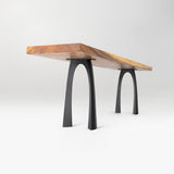 wooden table with black legs on a white background