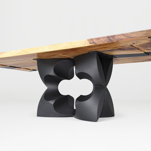 Metal Table Base 344 Chloris Petal 28.5" H – flower-inspired pedestal base handcrafted from heavy-duty powder-coated steel in matte black. This heavy-duty sculptural metal base features an elongated botanical petal silhouette and a sturdy foundation (1,000 lbs capacity; 34"L x 18"W). A premium DIY steel table base and modern furniture foundation specifically engineered to support a heavy live-edge tabletop, rectangular wood top, or marble slab in dining rooms.