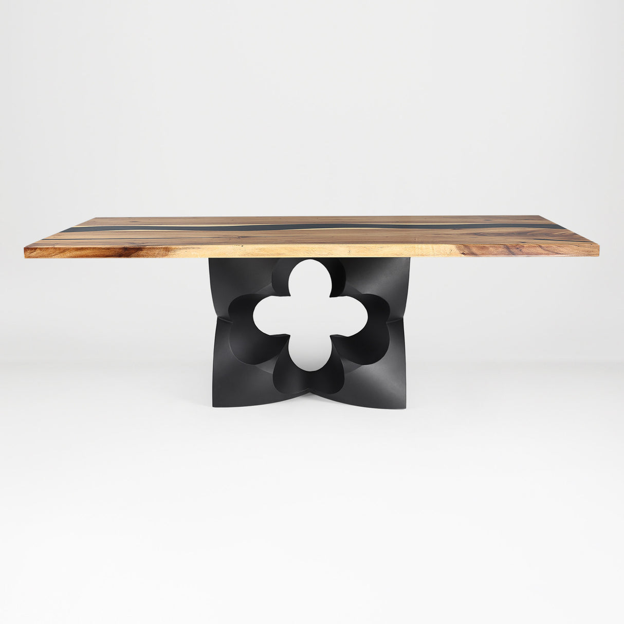 Metal Table Base 344 Chloris Petal 28.5" H – flower-inspired pedestal base handcrafted from heavy-duty powder-coated steel in matte black. This heavy-duty sculptural metal base features an elongated botanical petal silhouette and a sturdy foundation (1,000 lbs capacity; 34"L x 18"W). A premium DIY steel table base and modern furniture foundation specifically engineered to support a heavy live-edge tabletop, rectangular wood top, or marble slab in dining rooms.
