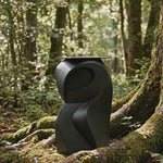 Metal Table Base 801 Owra 28.5" H – heavy-duty pedestal base featuring a sculptural owl-inspired silhouette in matte black powder-coated steel. This high-capacity metal base (1,000 lbs) provides a sturdy foundation specifically designed to support a heavy live-edge tabletop, thick marble slab, or glass top. A premium DIY steel table base and industrial furniture foundation that ensures steady support for custom dining room projects and professional commercial spaces.
