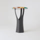 Handmade 36 inch counter metal table base with steel construction supporting stone tabletop in rustic cabin