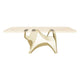 Brushed Gold Metal Table Base 803 Bullos 28.5" H – Industrial-luxury sculptural pedestal table base featuring an iconic, animal-inspired silhouette handcrafted from heavy-duty brushed gold stainless steel. This artisanal dining table base provides an ultra-sturdy foundation (1,000 lbs capacity; 42"L x 20"W). A premium DIY gold steel table base engineered with a precision-drilled 15" x 4.2" mounting plate to securely support a heavy live-edge tabletop, marble slab, or wood dining top.
