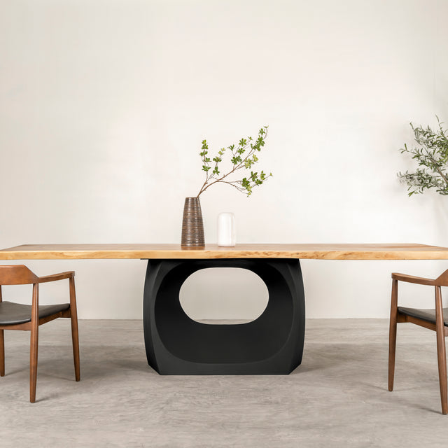 Alt Text:

Black Metal Table Base 308 Odila 28" H – contemporary geometric pedestal base handcrafted from heavy-duty steel in matte black. This minimalist metal dining base features a unique hollow design for gravel-filling to maximize stability and a sturdy foundation (1,000 lbs capacity; 39.4"L x 23.7"W). A premium DIY steel table base and modern furniture foundation engineered with a large pre-drilled mounting plate to support a heavy live-edge tabletop, marble slab, or wood dining top.