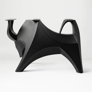 Metal Table Base 803 Bullos 28.5" H – bold bull-inspired pedestal base handcrafted from heavy-duty powder-coated steel in matte black. This sculptural metal base features powerful muscular curves and a wide sturdy foundation (1,000 lbs capacity), perfect for large custom dining tables, designer cafes, or boutique displays. A premium DIY furniture base and heavy-duty steel table base designed for marble, glass, or wood tops in industrial, minimalist, and Scandinavian interiors.