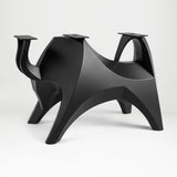 Metal Table Base 803 Bullos 28.5" H – bold bull-inspired pedestal base handcrafted from heavy-duty powder-coated steel in matte black. This sculptural metal base features powerful muscular curves and a wide sturdy foundation (1,000 lbs capacity), perfect for large custom dining tables, designer cafes, or boutique displays. A premium DIY furniture base and heavy-duty steel table base designed for marble, glass, or wood tops in industrial, minimalist, and Scandinavian interiors.