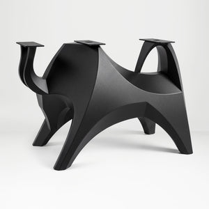 Metal Table Base 803 Bullos 28.5" H – bold bull-inspired pedestal base handcrafted from heavy-duty powder-coated steel in matte black. This sculptural metal base features powerful muscular curves and a wide sturdy foundation (1,000 lbs capacity), perfect for large custom dining tables, designer cafes, or boutique displays. A premium DIY furniture base and heavy-duty steel table base designed for marble, glass, or wood tops in industrial, minimalist, and Scandinavian interiors.
