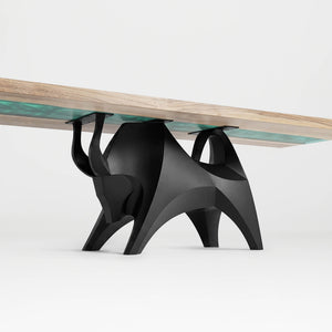 Metal Table Base 803 Bullos 28.5" H – bold bull-inspired pedestal base handcrafted from heavy-duty powder-coated steel in matte black. This sculptural metal base features powerful muscular curves and a wide sturdy foundation (1,000 lbs capacity), perfect for large custom dining tables, designer cafes, or boutique displays. A premium DIY furniture base and heavy-duty steel table base designed for marble, glass, or wood tops in industrial, minimalist, and Scandinavian interiors.