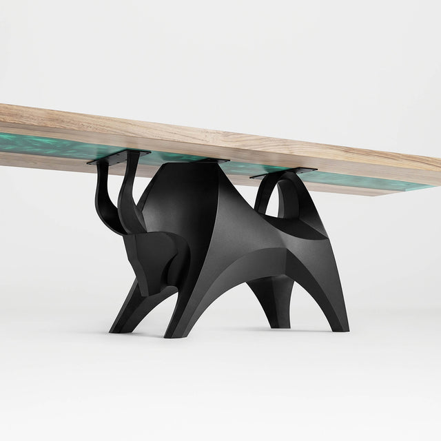 Metal Table Base 803 Bullos 28.5" H – bold bull-inspired pedestal base handcrafted from heavy-duty powder-coated steel in matte black. This sculptural metal base features powerful muscular curves and a wide sturdy foundation (1,000 lbs capacity), perfect for large custom dining tables, designer cafes, or boutique displays. A premium DIY furniture base and heavy-duty steel table base designed for marble, glass, or wood tops in industrial, minimalist, and Scandinavian interiors.
