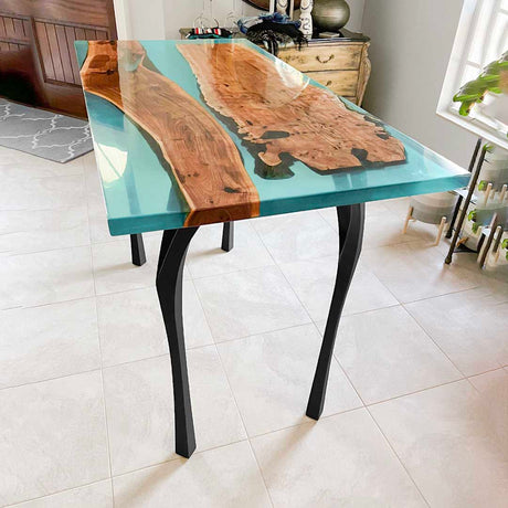 Modern counter table legs 34" H metal with matte black finish in cozy coffee shop setting