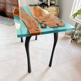 Modern counter table legs 34" H metal with matte black finish in cozy coffee shop setting